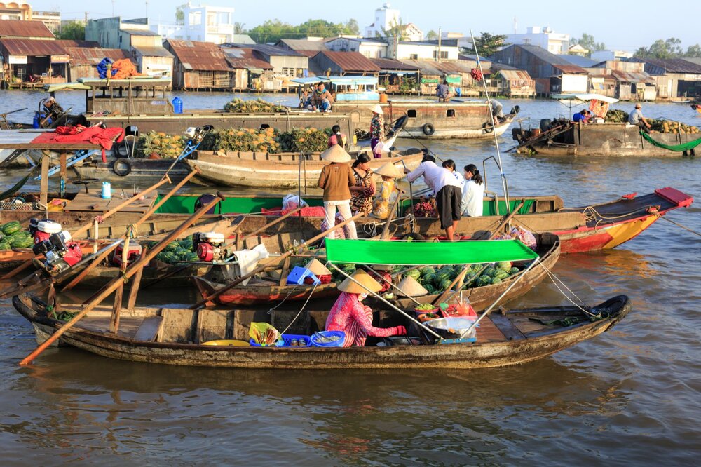 Cai Rang floating market Mekong Delta Can Tho food boat river Vietnam
