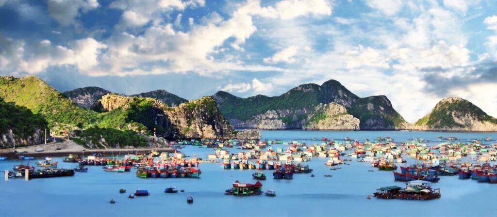 Cat Ba Town harbour fishing boats limestone mountains