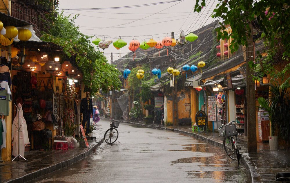 Hoi An Old Town at night with silk lanterns lit along the streets