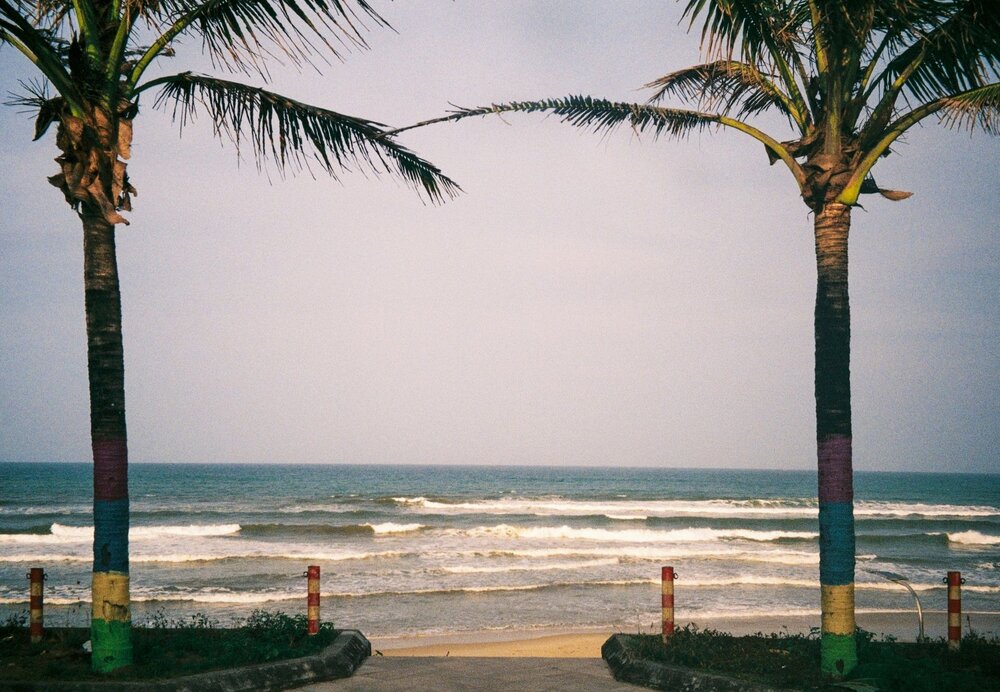 Ky Co Beach near Quy Nhon with turquoise water and limestone headlands