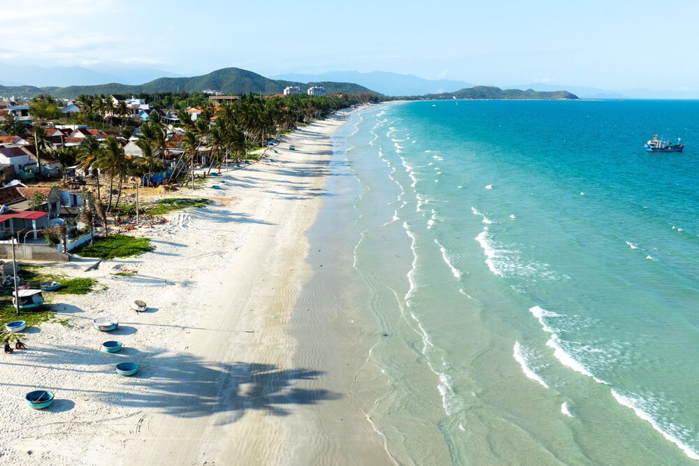 Nha Trang white sand beach palm promenade warm May sea