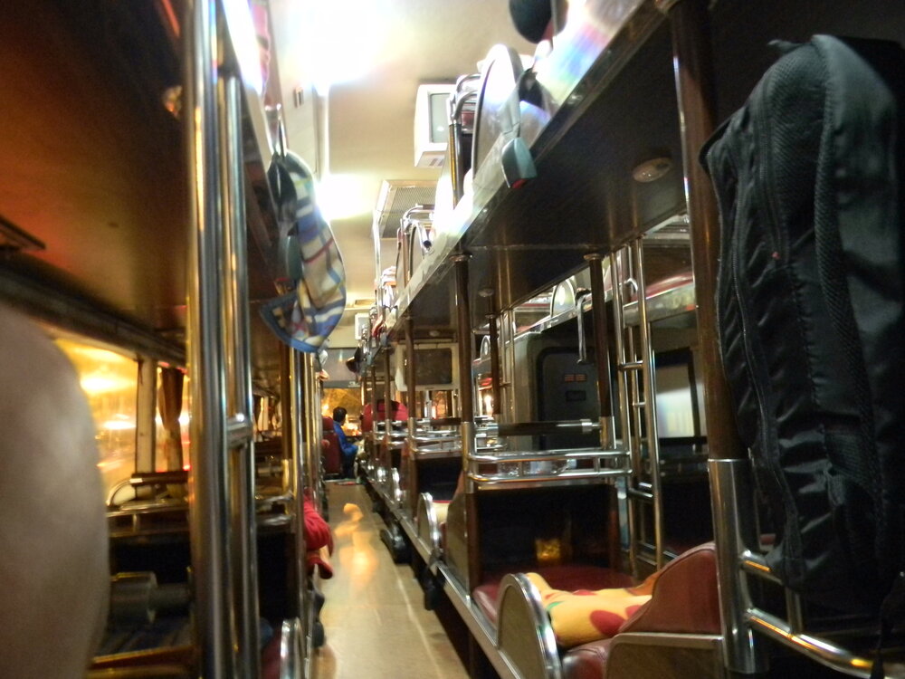 Vietnamese overnight sleeper bus with reclining pod seats